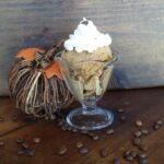 ice cream with whipped cream in a glass